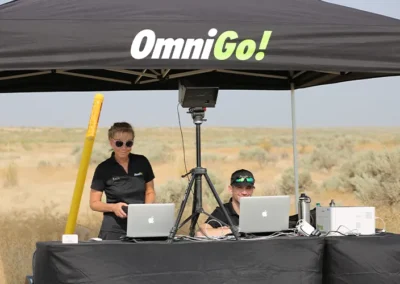 Staff managing race timing station